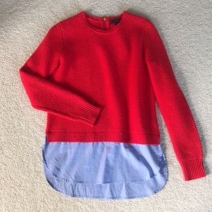 Red J Crew sweater with shirt tail